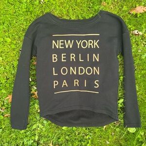 blue motion Black long sleeve sweatshirt with gold lettering size xs